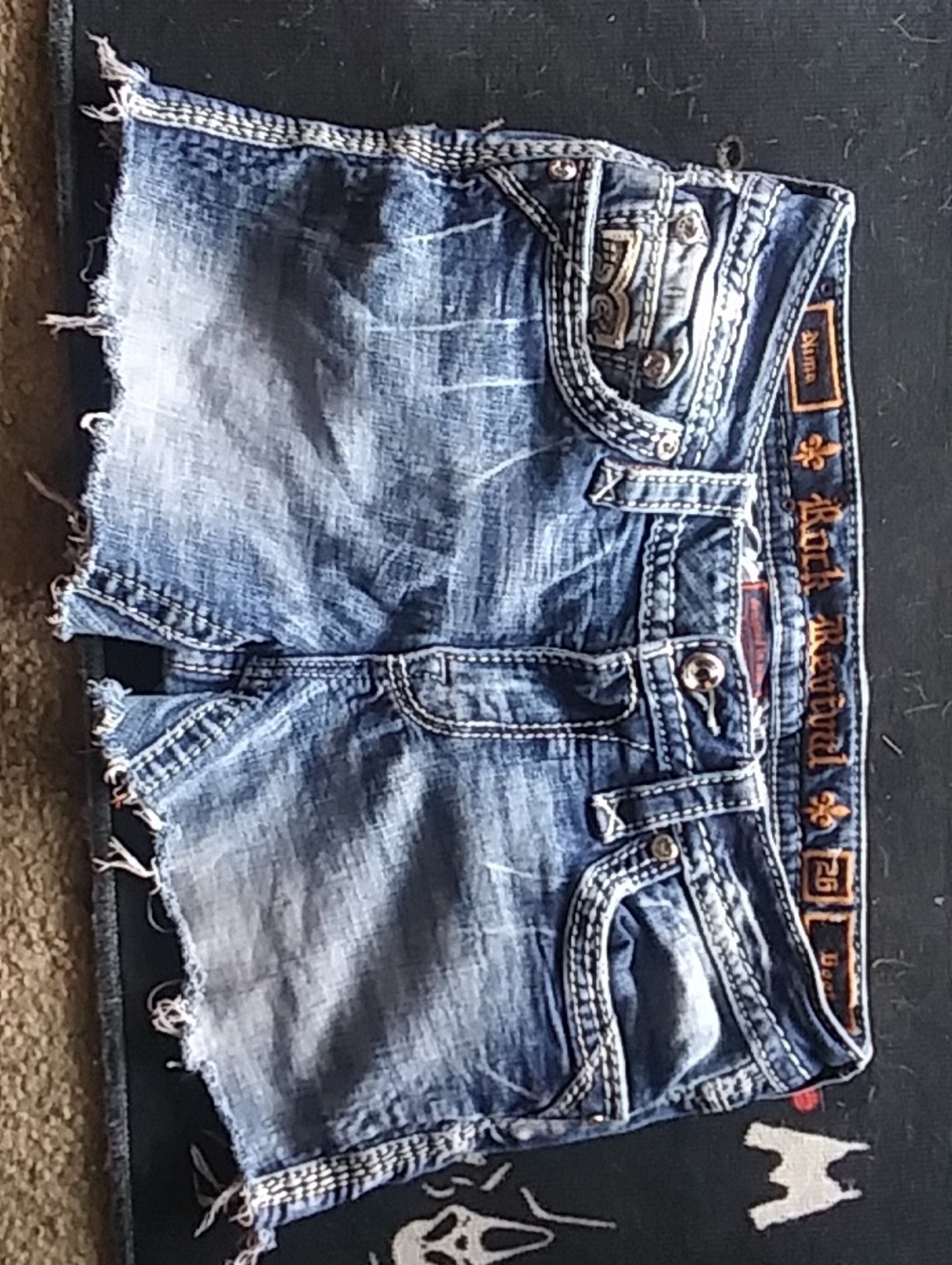 Rock Revival Women's Faded Blue Distressed Denim Cutoff Shorts